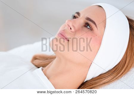 Woman After Face Biorevitalization Procedure In Salon, Closeup. Cosmetic Treatment