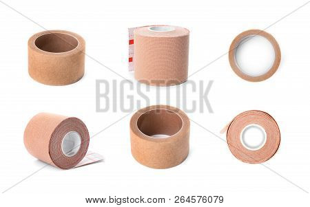Set With Sticking Plaster Rolls On White Background. Medical Objects