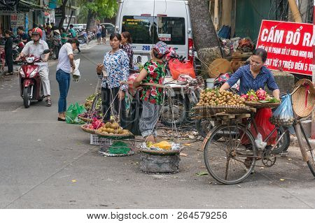 Hanoi, Vietnam - August 22, 2017: Street Market With Pedlars, Hawkers And Farmers Selling Fresh Prod