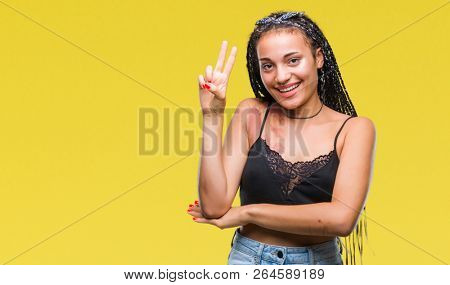 Young braided hair african american with pigmentation blemish birth mark over isolated background smiling with happy face winking at the camera doing victory sign. Number two.