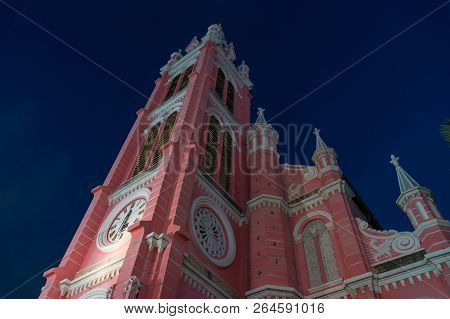 Tan Dinh Church Exterior Against Deep Blue Sky On The Background. Tan Dinh Church Is Popular Tourist