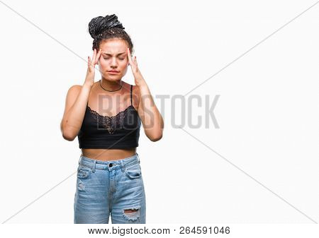 Young braided hair african american with pigmentation blemish birth mark over isolated background with hand on head for pain in head because stress. Suffering migraine.