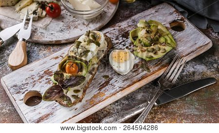 Food Banner. Appetizing Sandwiches With Cheese, Egg, Avocado And Pumpkin Seeds.