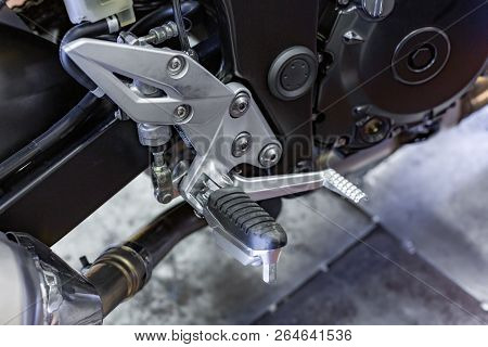 Cropped Close Up Shot Of Beautiful And Custom Made Motorcycle In The Workshop