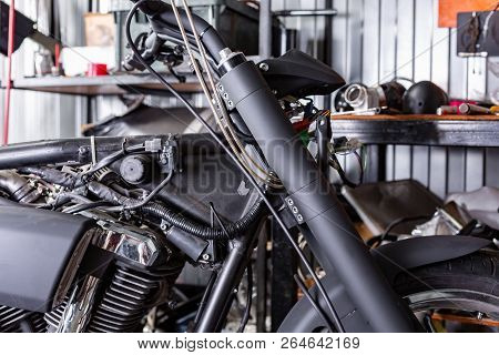 Cropped Close Up Shot Of Beautiful And Custom Made Motorcycle In The Workshop