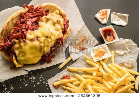 Kumru Sandwich With Sausage, Ham, Cheddar And Potatoes, (fast Food Concept.)