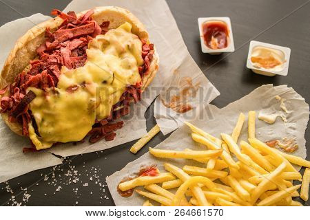 Kumru Sandwich With Sausage, Ham, Cheddar And Potatoes, (fast Food Concept.)