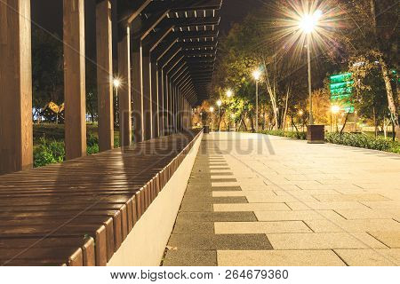 Wooden Bench In Perspective From Bars On The Street, Art Decor
