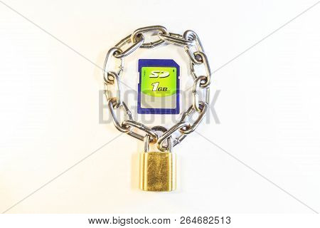 Sd Memory Card Protected By A Lock With A Chain