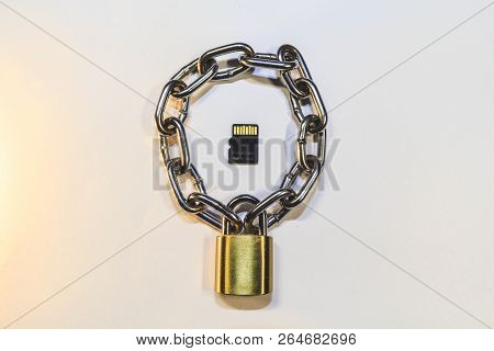 Micro Sd Card Is Protected By A Lock With A Chain