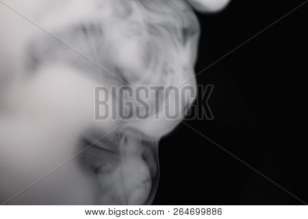 Cigarette Smoke On Black Background Detailed Close-up
