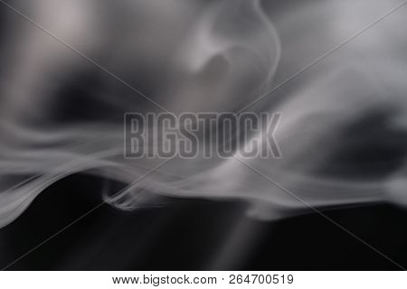 Cigarette Smoke On Black Background Detailed Close-up
