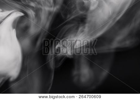 Cigarette Smoke On Black Background Detailed Close-up