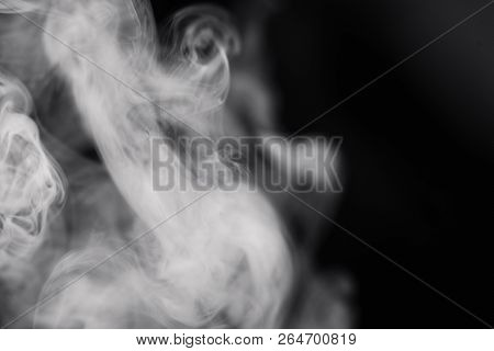 Cigarette Smoke On Black Background Detailed Close-up