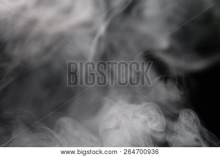Cigarette Smoke On Black Background Detailed Close-up