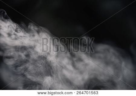 Cigarette Smoke On Black Background Detailed Close-up