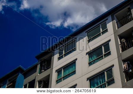 Modern Condominium Building Real Etate In City With Blue Sky