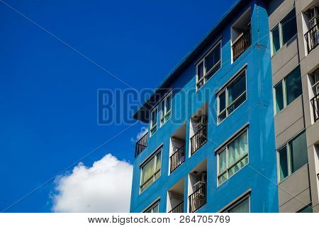 Modern Condominium Building Real Etate In City With Blue Sky