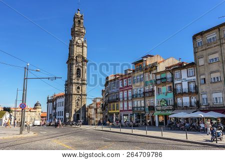 Porto 30 September, 2018: On The Streets Of Porto, Passersby Near Torre Dos Clerigos.