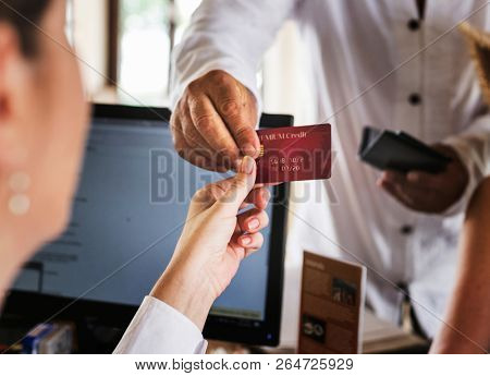 Guests checking in to a hotel