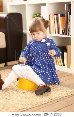 Cute Little Girl Sit On Her Chamber Pot Do Caca Playing With Cellphone Portrait