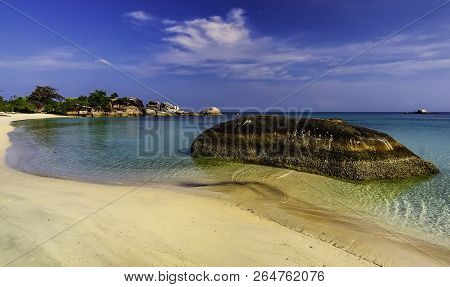 View Of A Group Of Big Stones On The Tanjung Tinggi Beach From Island Belitung/indonesia/