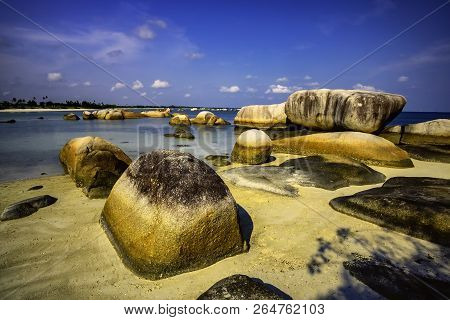 View Of A Group Of Big Stones On The Tanjung Tinggi Beach From Island Belitung/indonesia/