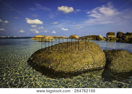 View Of A Group Of Big Stones On The Tanjung Tinggi Beach From Island Belitung/indonesia/