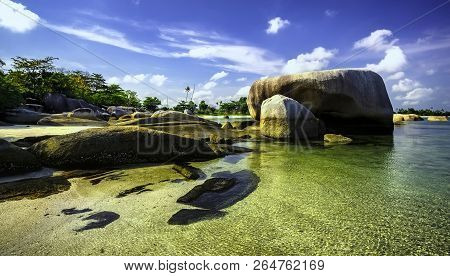 View Of A Group Of Big Stones On The Tanjung Tinggi Beach From Island Belitung/indonesia/