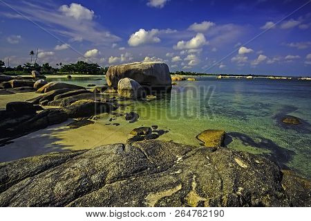 View Of A Group Of Big Stones On The Tanjung Tinggi Beach From Island Belitung/indonesia/