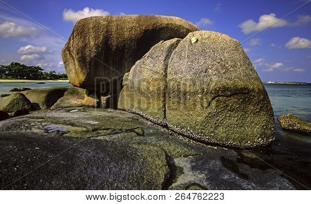 View Of A Group Of Big Stones On The Tanjung Tinggi Beach From Island Belitung/indonesia/