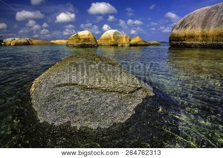 View Of A Group Of Big Stones On The Tanjung Tinggi Beach From Island Belitung/indonesia/