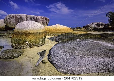 View Of A Group Of Big Stones On The Tanjung Tinggi Beach From Island Belitung/indonesia/