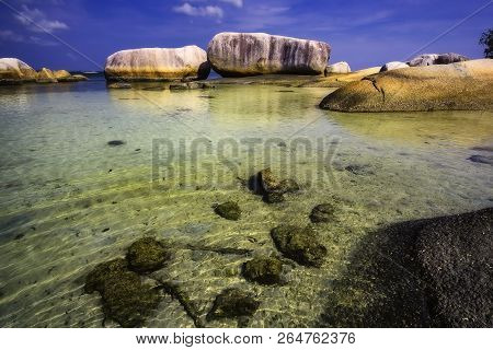 View Of A Group Of Big Stones On The Tanjung Tinggi Beach From Island Belitung/indonesia/