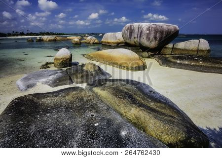 View Of A Group Of Big Stones On The Tanjung Tinggi Beach From Island Belitung/indonesia/