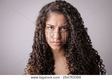 Angry beautiful exotic woman.
