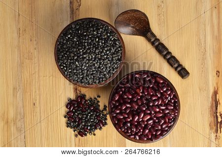 Raw Uncooked Pulses, Kidney Beans And Urad Daal On Wooden Placemats,