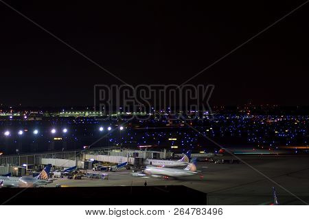 Chicago, Illinois, United States - May 11th, 2018: Several Airplanes At The Gate At Chicago Ohare In
