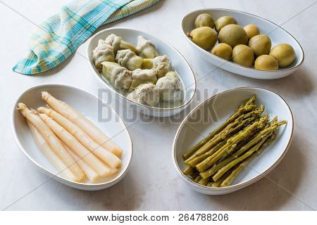 Pickled Vegetables Green And White Asparagus, Artichoke Heart And Unripe Green Almond Pickles In Pla