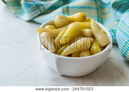 Pickled Green Pepper Pickles In Bowls.