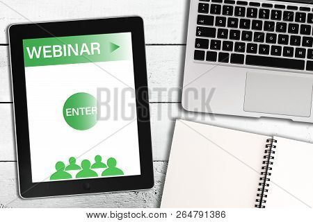 Directly Above Shot Of Webinar E-learning Concept With Laptop, Tablet Computer And Notepad On Rustic