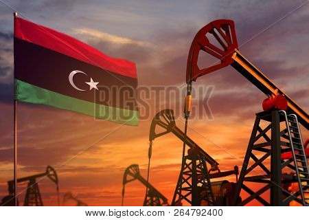 Libya Oil Industry Concept, Industrial Illustration. Libya Flag And Oil Wells And The Red And Blue S