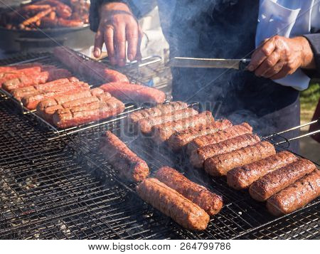 Romanian Mititei And Cooked On The Grill In The Smoke