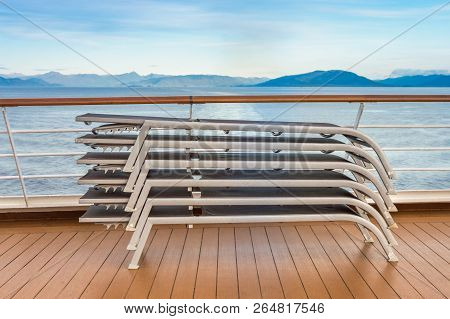 Stacked Lounge Chairs, Lido Deck Of Cruise Ship, Inside Passage, Bc, Canada.