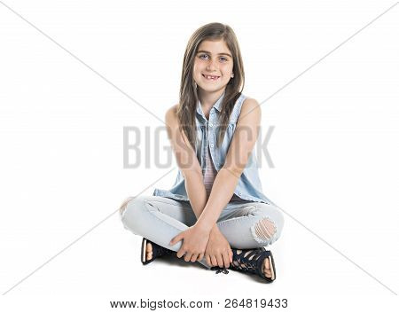 A Studio Portrait Of Smiling Girl Full Body