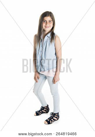 A Studio Portrait Of Smiling Girl Full Body