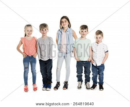 Group Of Five Young Children In Studio