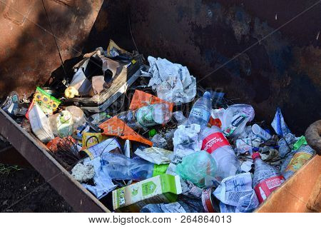 10.14.2018 Minsk, Republic Of Belarus: People Throw Waste And Garbage On The Street. Environmental P