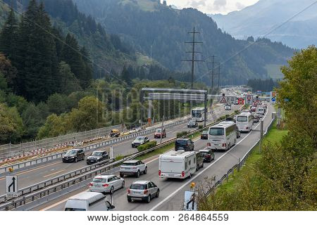 Vehicles Waiting In Line For Entering Gotthard Tunnel On Switzerland
