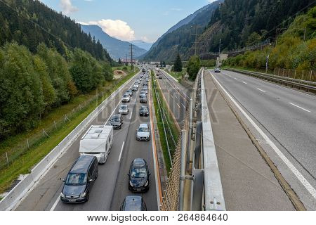 Vehicles Waiting In Line For Entering Gotthard Tunnel On Switzerland
